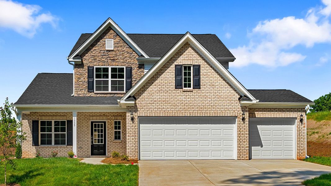 Front exterior of a new home in Brooke Hill, Lewisville, NC, highlighting curb appeal (Image 1). Front exterior of a new home in Brooke Hill, Lewisville, NC, highlighting curb appeal (Image 1).