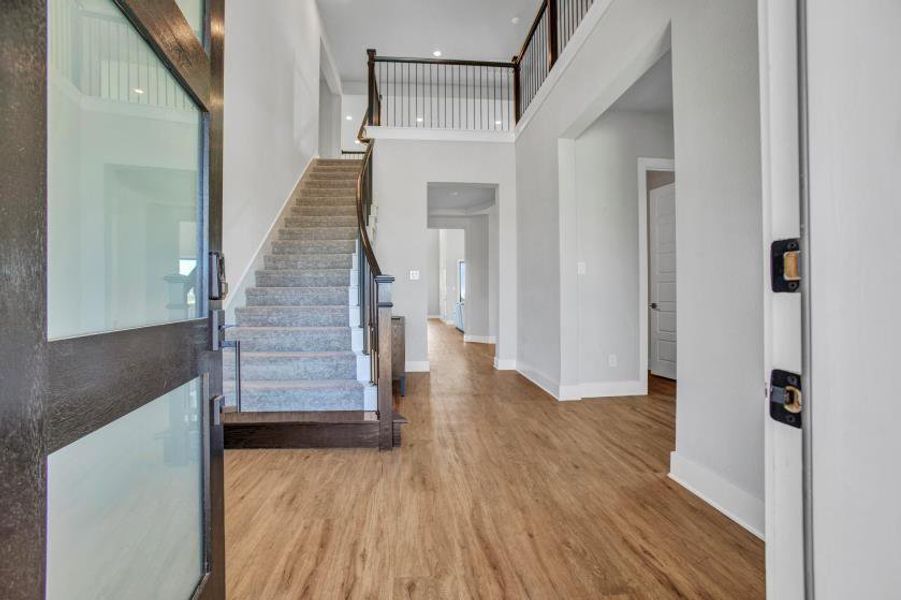 dramatic foyer with soaring ceiling dramatic foyer with soaring ceiling