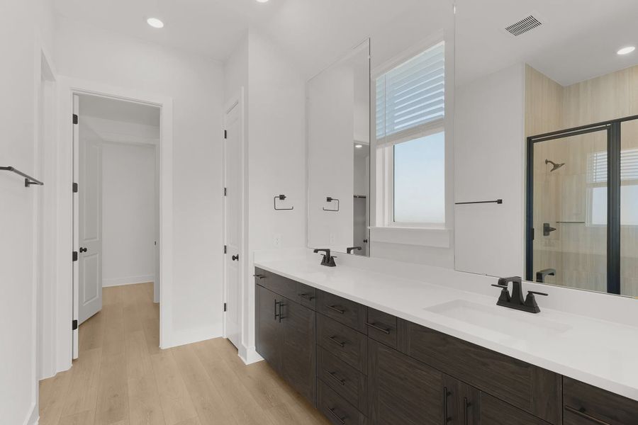 Representative furnished interior of a home built from the Barron by Chesmar Homes in Lariat, Liberty Hill (Image 12).
