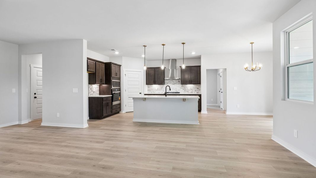 Representative furnished interior of a home built from the Ansley by D.R. Horton in Harvest Point, Spring Hill (Image 7).