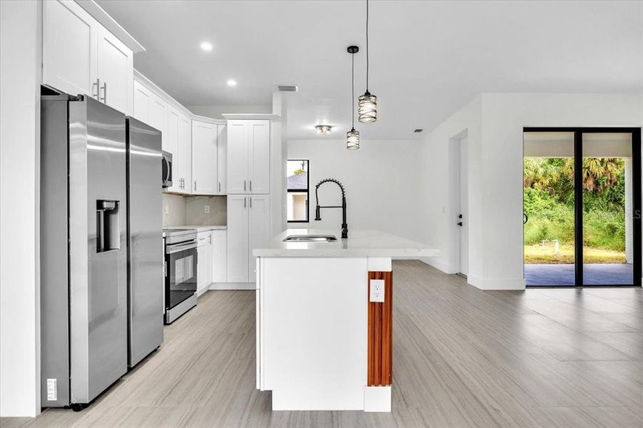 Furnished interior view inside a new home in , Port Charlotte (Image 10).