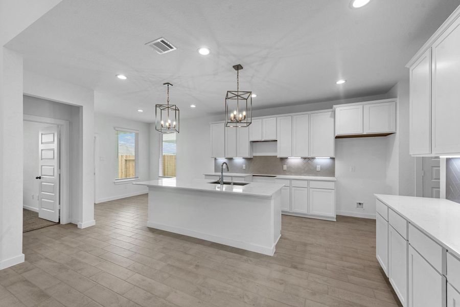 Furnished interior view inside a new home in Grand Mason Crossing, Park Row (Image 6).