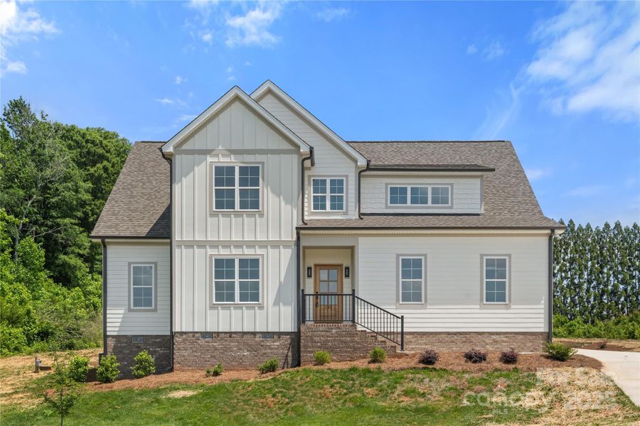 Front exterior of a new home in , Mocksville, NC, highlighting curb appeal (Image 1). Front exterior of a new home in , Mocksville, NC, highlighting curb appeal (Image 1).