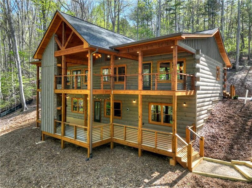 Exterior details and patio area of a home in , Ellijay (Image 25).
