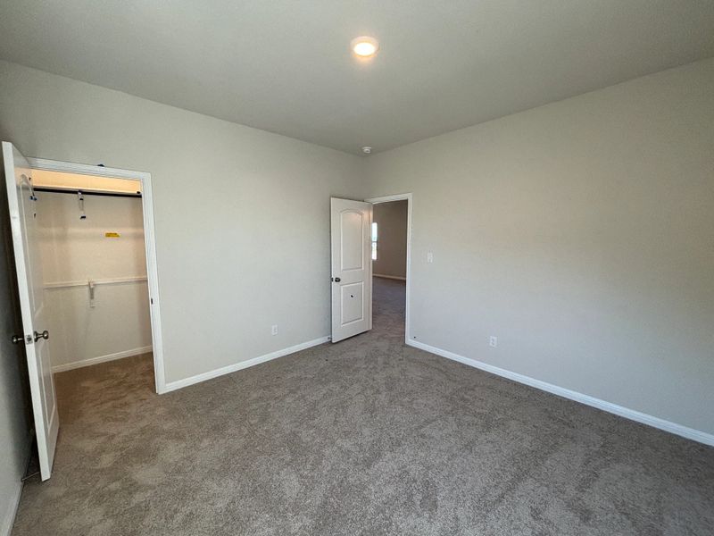 Spacious, unfurnished interior of a new home in Cannon Ranch 40s, Dripping Springs (Image 32).