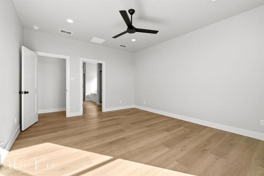 Unfurnished bedroom featuring ceiling fan, light wood-style floors, and recessed lighting