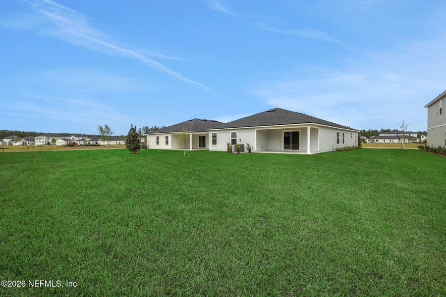 Exterior details and patio area of a home in Amberly, Green Cove Springs (Image 23).
