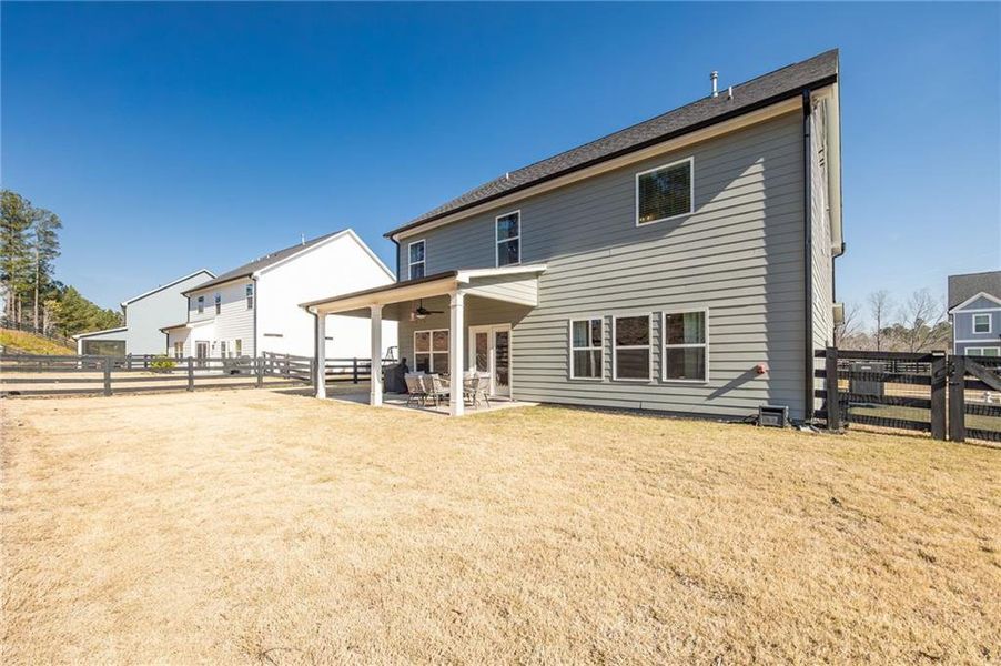 Exterior details and patio area of a home in NorthFarm at NatureWalk, Dallas (Image 26).