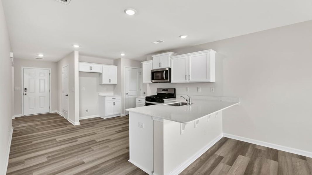Furnished interior view inside a new home in Treemont Commons, Wellford (Image 5). Furnished interior view inside a new home in Treemont Commons, Wellford (Image 5).