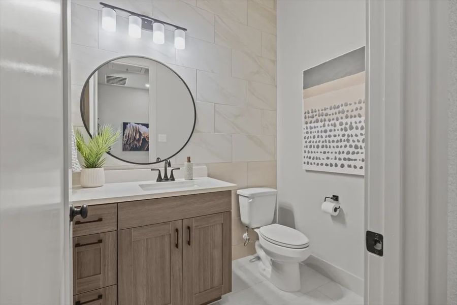 Representative furnished interior of a home built from the Malani by Chesmar Homes in Lakes of Cane Island, Katy (Image 14).