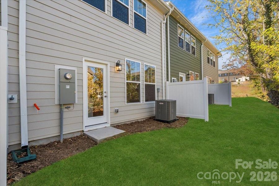 Exterior details and patio area of a home in Clayton Crossing, Arden (Image 3).