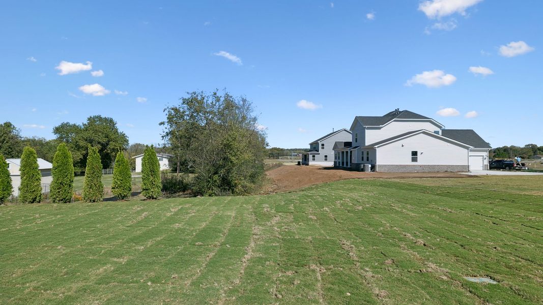Front exterior of a new home in Pottsview, Smyrna, TN, highlighting curb appeal (Image 2). Front exterior of a new home in Pottsview, Smyrna, TN, highlighting curb appeal (Image 2).