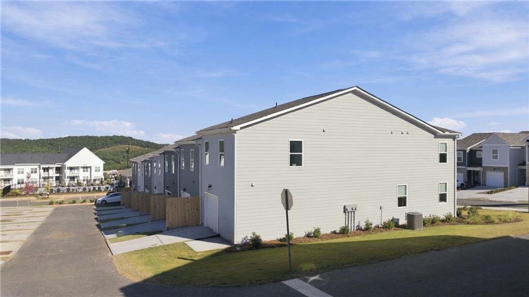 Front exterior of a new home in Stegall Village, Emerson, GA, highlighting curb appeal (Image 16).
