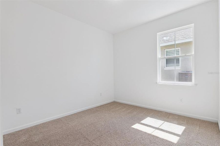 Spacious, unfurnished interior of a new home in Grand Isle, Grand Island (Image 11).