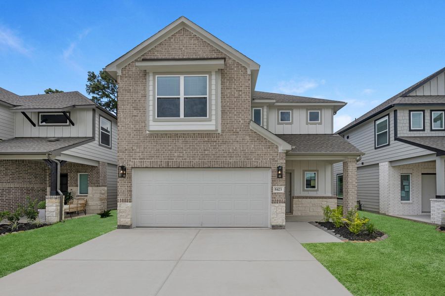 Front exterior of a new home in Cypresswood Landing, Humble, TX, highlighting curb appeal (Image 18).