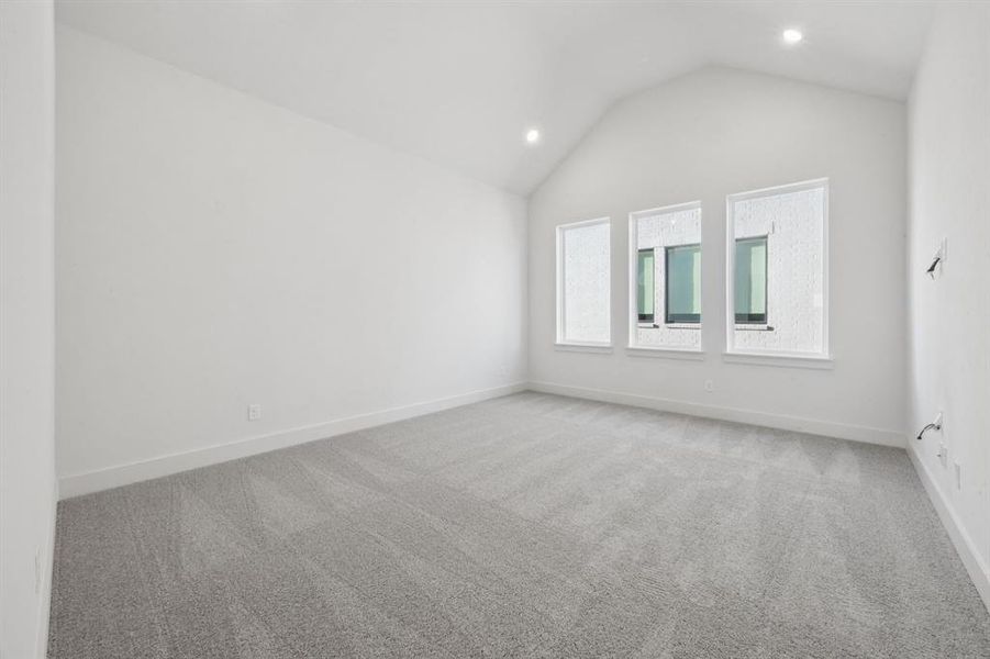 This spacious and light filled game room offers the perfect place to host those big game day parties!