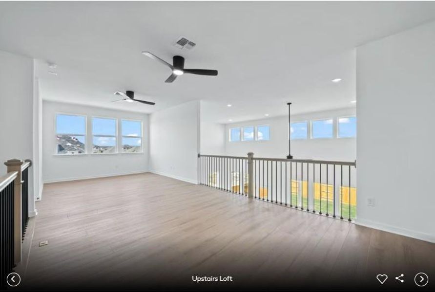 Interior photos- Photo of Pulte model home with same floor plan, not of actual home listed.