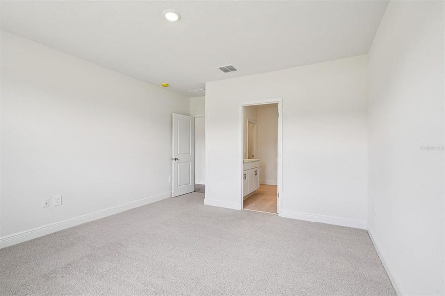Spacious, unfurnished interior of a new home in The Reserve at Hammock Oaks - Signature Series, Lady Lake (Image 25).