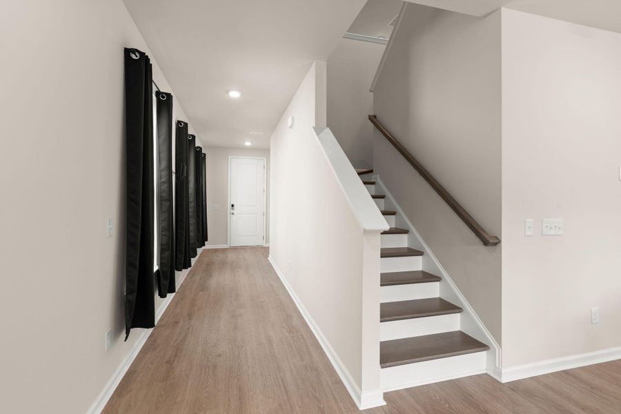 Spacious, unfurnished interior of a new home in Jasmine Point at Lakes of Cane Bay, Summerville (Image 21).