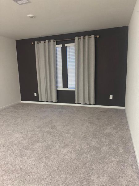Spacious, unfurnished interior of a new home in Sunterra, Katy (Image 18).