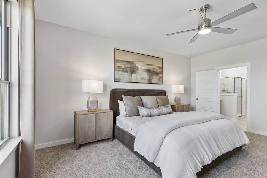 Primary Suite in a Sunset Ranch Winters Model Home in Gunter TX by Trophy Signature Homes
