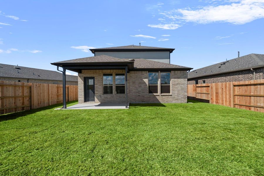 Exterior details and patio area of a home in River Ranch, Dayton (Image 4).
