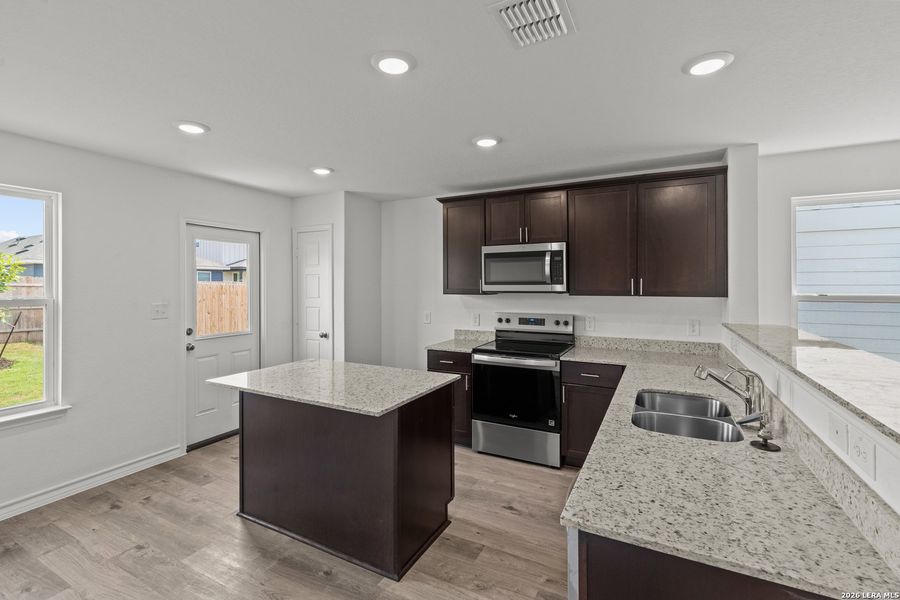 Furnished interior view inside a new home in Dove Song, Marion (Image 5).