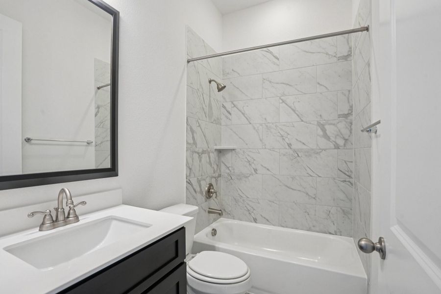 Furnished interior view inside a new home in Del Bello Lakes 60', Manvel (Image 15).