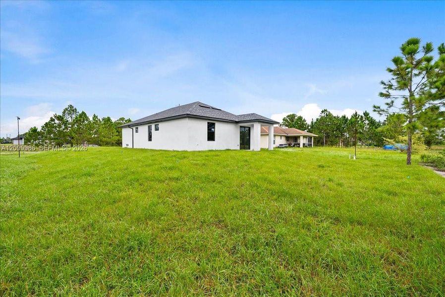Exterior details and patio area of a home in , Lehigh Acres (Image 19).