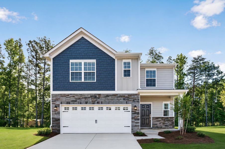 Front exterior of a new home in Cannon Village, York, SC, highlighting curb appeal (Image 1). Front exterior of a new home in Cannon Village, York, SC, highlighting curb appeal (Image 1).