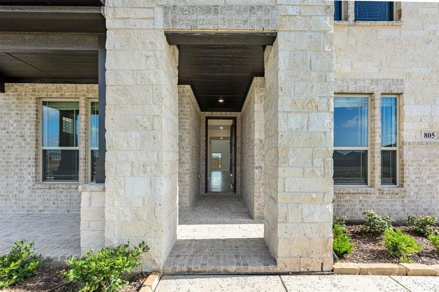 Exterior details and patio area of a home in Wildflower Ranch 60-65, Justin (Image 21). Exterior details and patio area of a home in Wildflower Ranch 60-65, Justin (Image 21).
