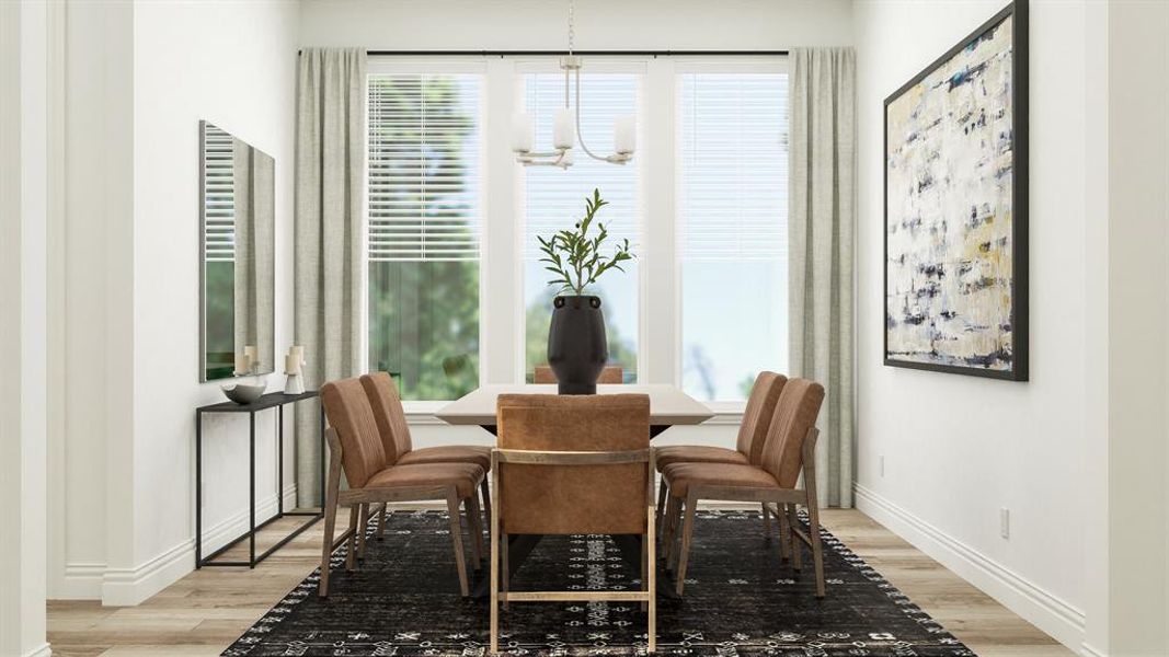 Dining space featuring light hardwood / wood-style flooring and a chandelier