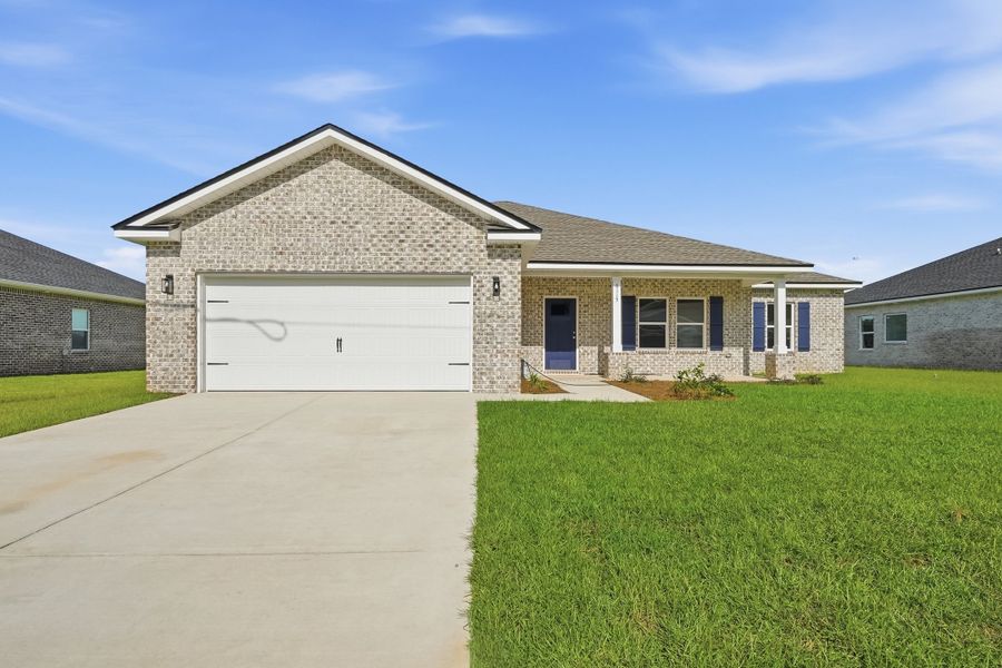 Front exterior of a new home in Southern Charm, Crestview, FL, highlighting curb appeal (Image 1). Front exterior of a new home in Southern Charm, Crestview, FL, highlighting curb appeal (Image 1).