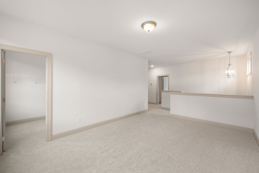 Representative unfurnished interior of a home built from the The Hampton by RobuckHomes in Baylee Ridge, Selma (Image 184).