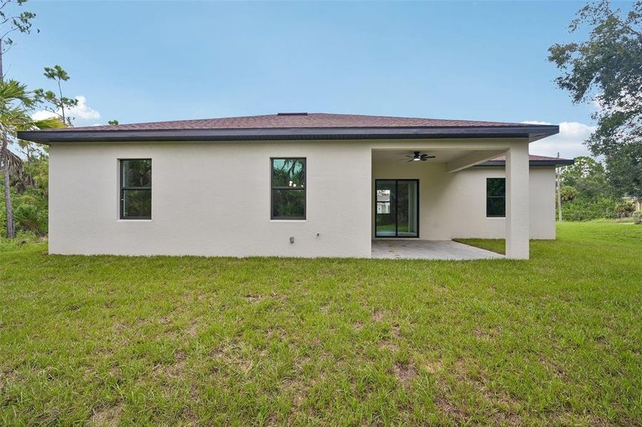 Exterior details and patio area of a home in , North Port (Image 17).