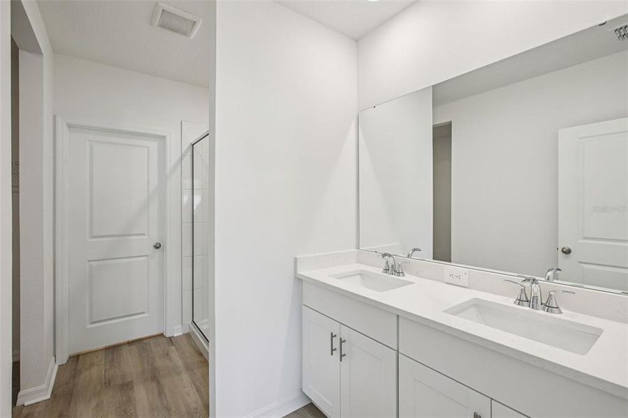 Furnished interior view inside a new home in Two Rivers - Premier Series, Zephyrhills (Image 4). Furnished interior view inside a new home in Two Rivers - Premier Series, Zephyrhills (Image 4).