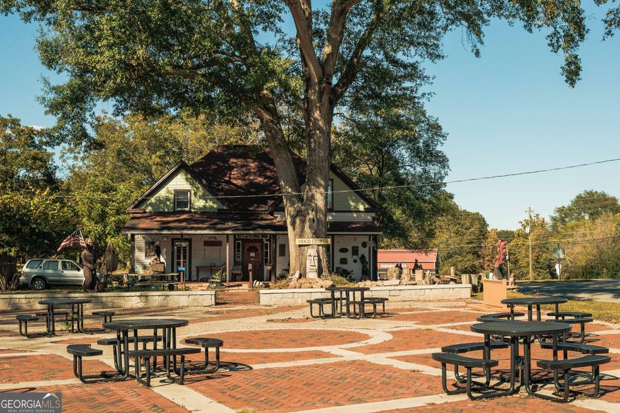 Front exterior of a new home in Summerlin, Winder, GA, highlighting curb appeal (Image 37). Front exterior of a new home in Summerlin, Winder, GA, highlighting curb appeal (Image 37).