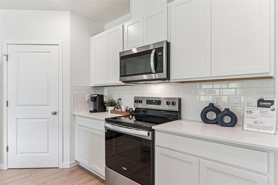 Furnished interior view inside a new home in Crossroads at Kelly Park, Apopka (Image 12).