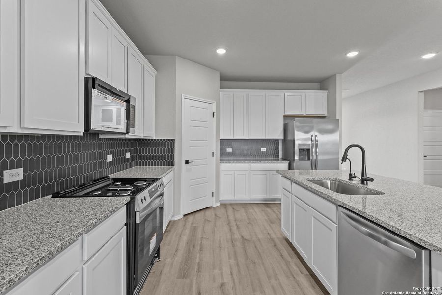 Furnished interior view inside a new home in Comanche Ridge, San Antonio (Image 49). Furnished interior view inside a new home in Comanche Ridge, San Antonio (Image 49).