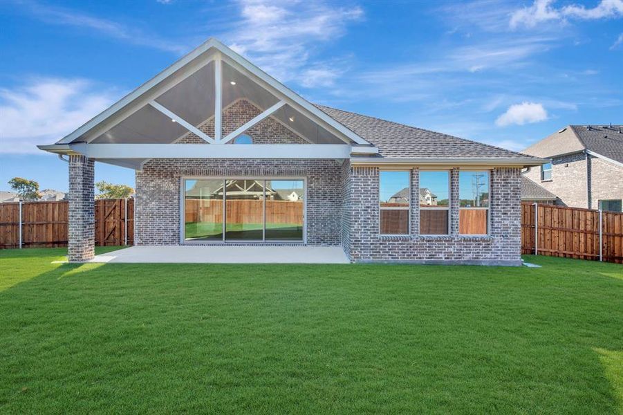 Exterior details and patio area of a home in Kreymer at the Park, Wylie (Image 3). Exterior details and patio area of a home in Kreymer at the Park, Wylie (Image 3).