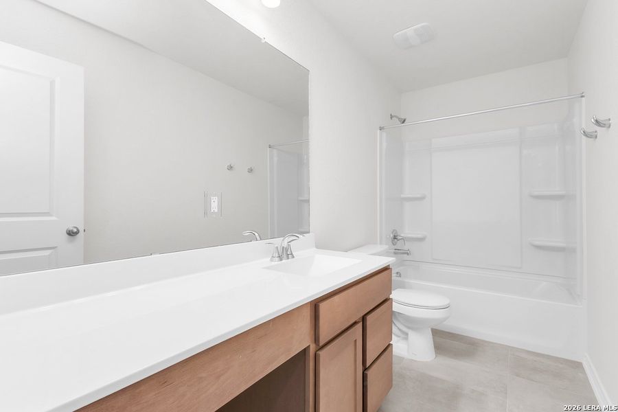 Furnished interior view inside a new home in Medina Crossing, Von Ormy (Image 6). Furnished interior view inside a new home in Medina Crossing, Von Ormy (Image 6).