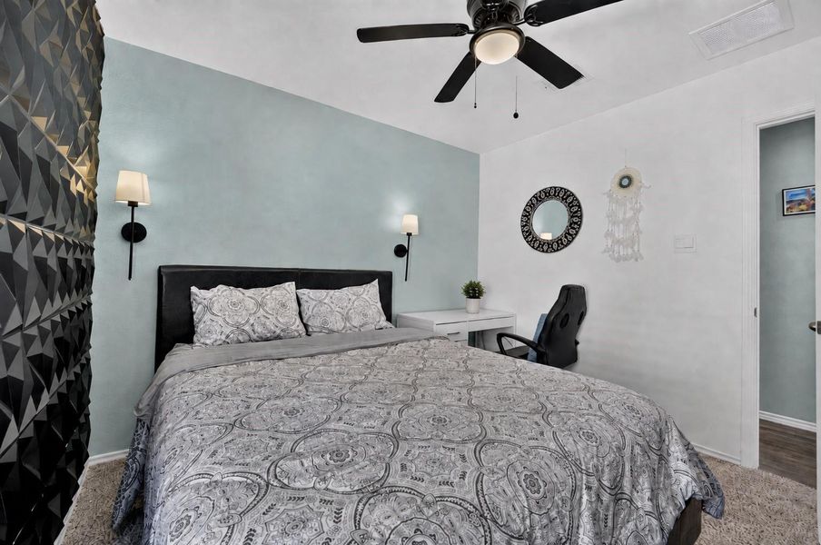 Secondary bedroom features a ceiling fan, natural light and flexible space for guests, a home office or hobby room. Secondary bedroom features a ceiling fan, natural light and flexible space for guests, a home office or hobby room.