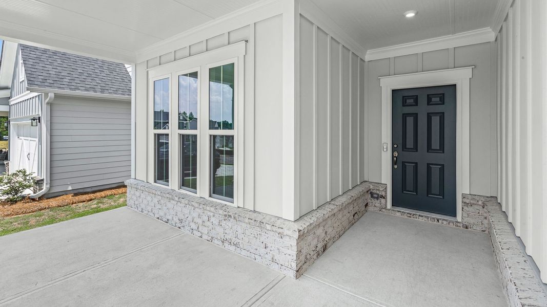 Exterior details and patio area of a home in Hunters Creek, Flowery Branch (Image 27). Exterior details and patio area of a home in Hunters Creek, Flowery Branch (Image 27).
