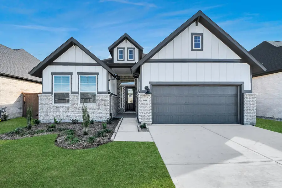 Front exterior of a new home in Beacon Point, Texas City, TX, highlighting curb appeal (Image 27).