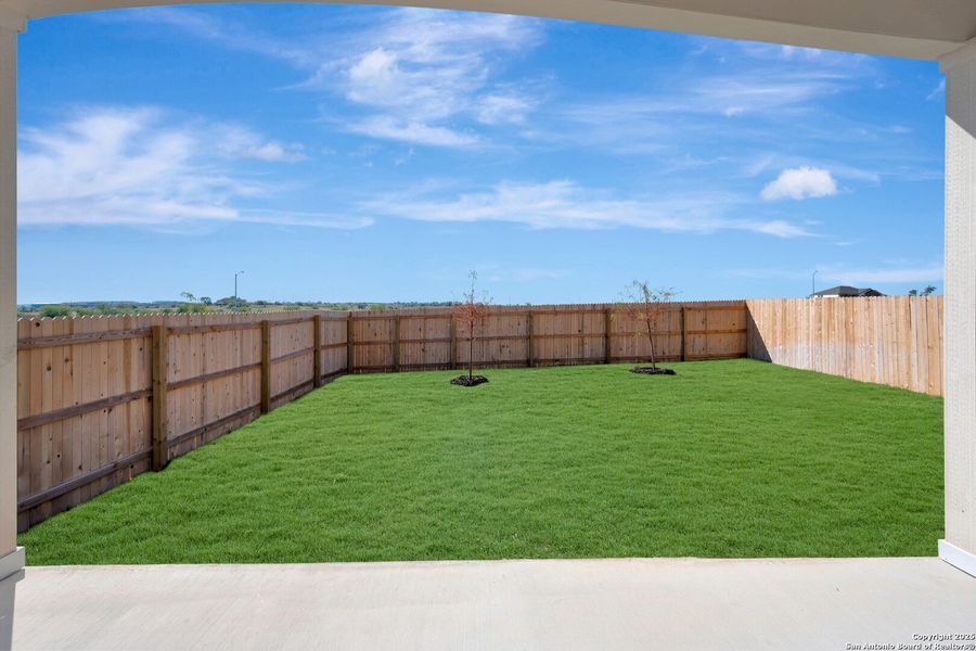 Exterior details and patio area of a home in Paloma Park, Converse (Image 24).