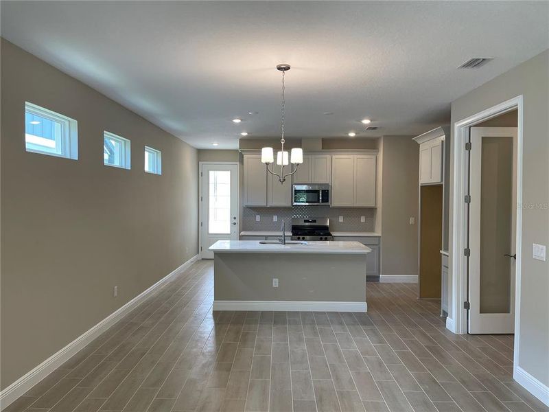 Furnished interior view inside a new home in Fairway Pointe - 55+ Villa Community, Sun City Center (Image 4).