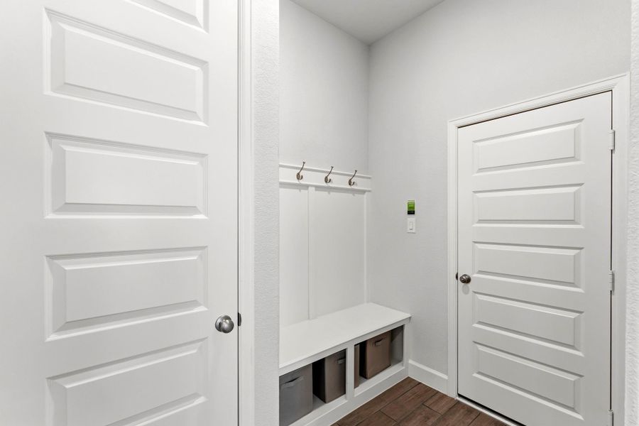 As you enter from 3 Car Garage, a Convenient Built In Locker Drop Zone and Closet Make for Easy Living As you enter from 3 Car Garage, a Convenient Built In Locker Drop Zone and Closet Make for Easy Living