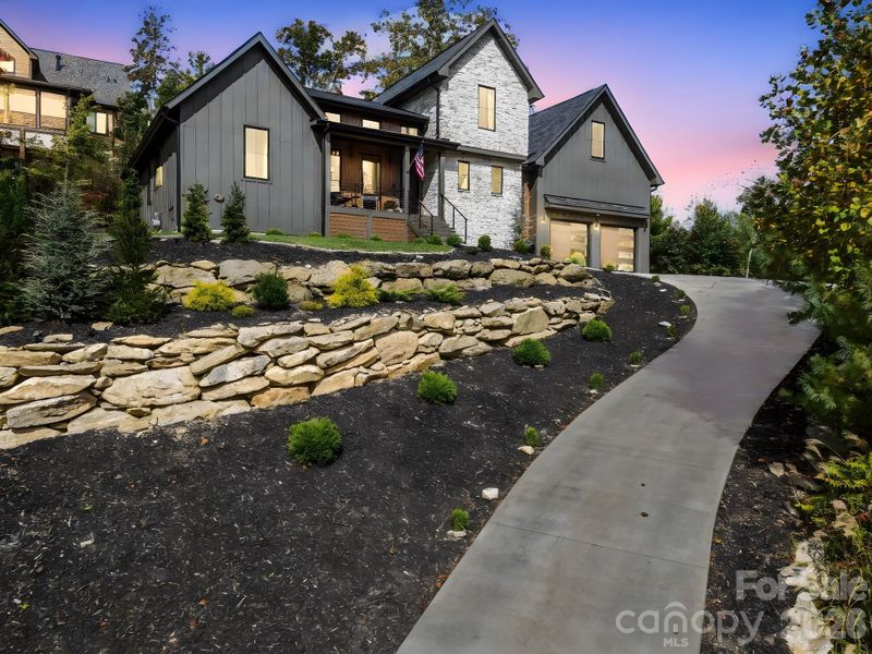 Front exterior of a new home in , Hendersonville, NC, highlighting curb appeal (Image 23).