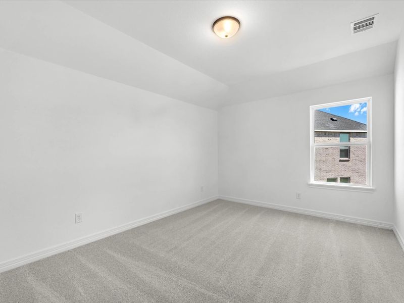 Secondary bedroom. Sample product photo. Actual exterior and interior selections may vary by homesite. Photo may be virtually staged.