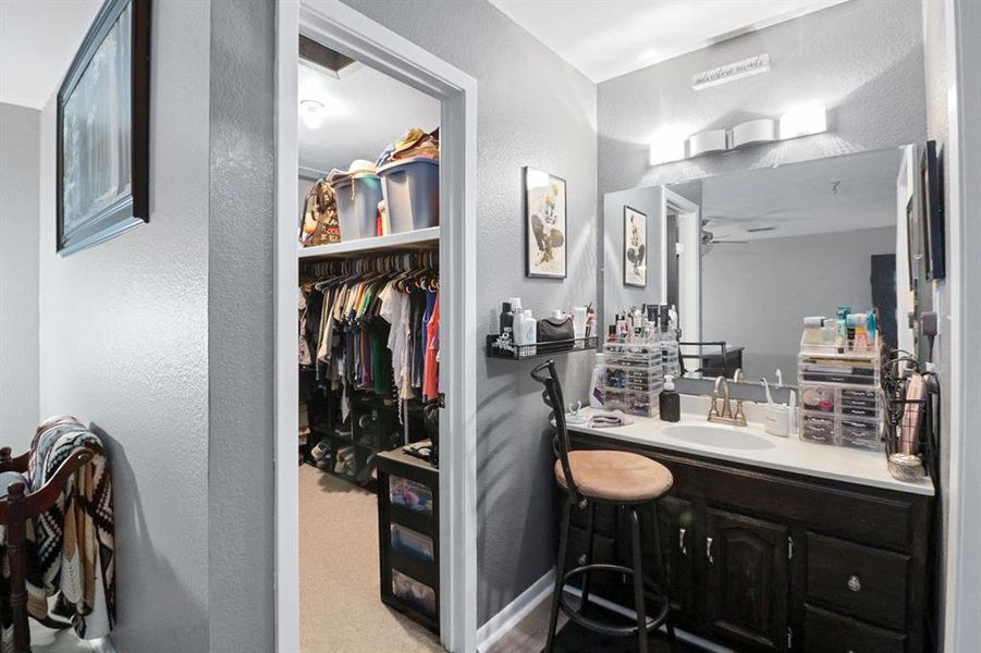 Primary Bathroom with walk-in closet